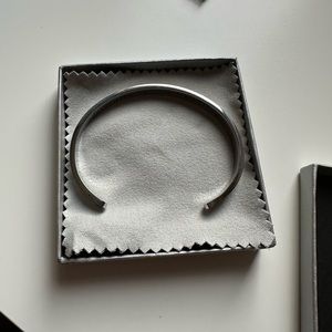 sliver bracelet with words in graved